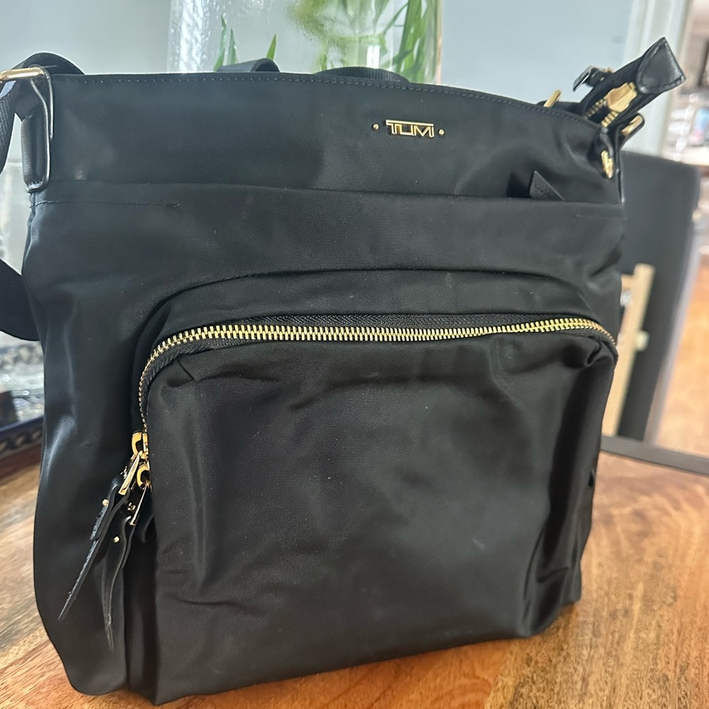 Tumi Black and Red Crossbody Bag